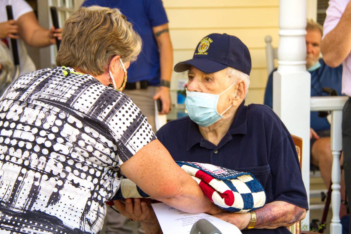 veteran receiving flag